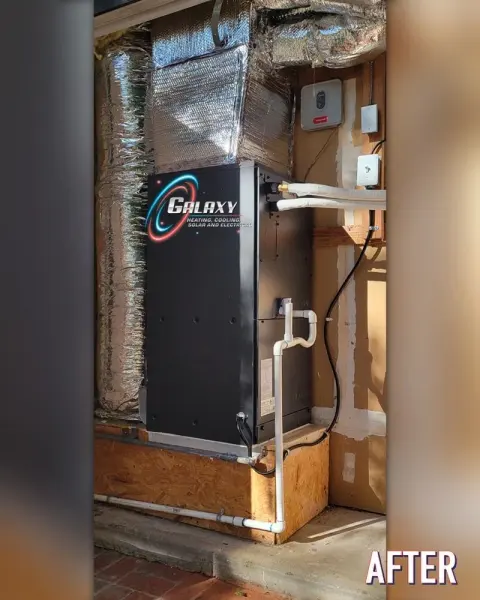 Vertical air handler with foil-faced ductwork above a raised platform in San Francisco