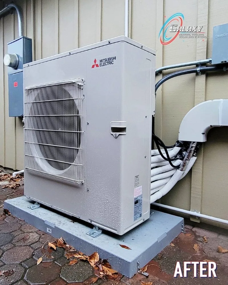 Mitsubishi Electric single-fan outdoor unit on a pad with a covered line-set route in Walnut Creek