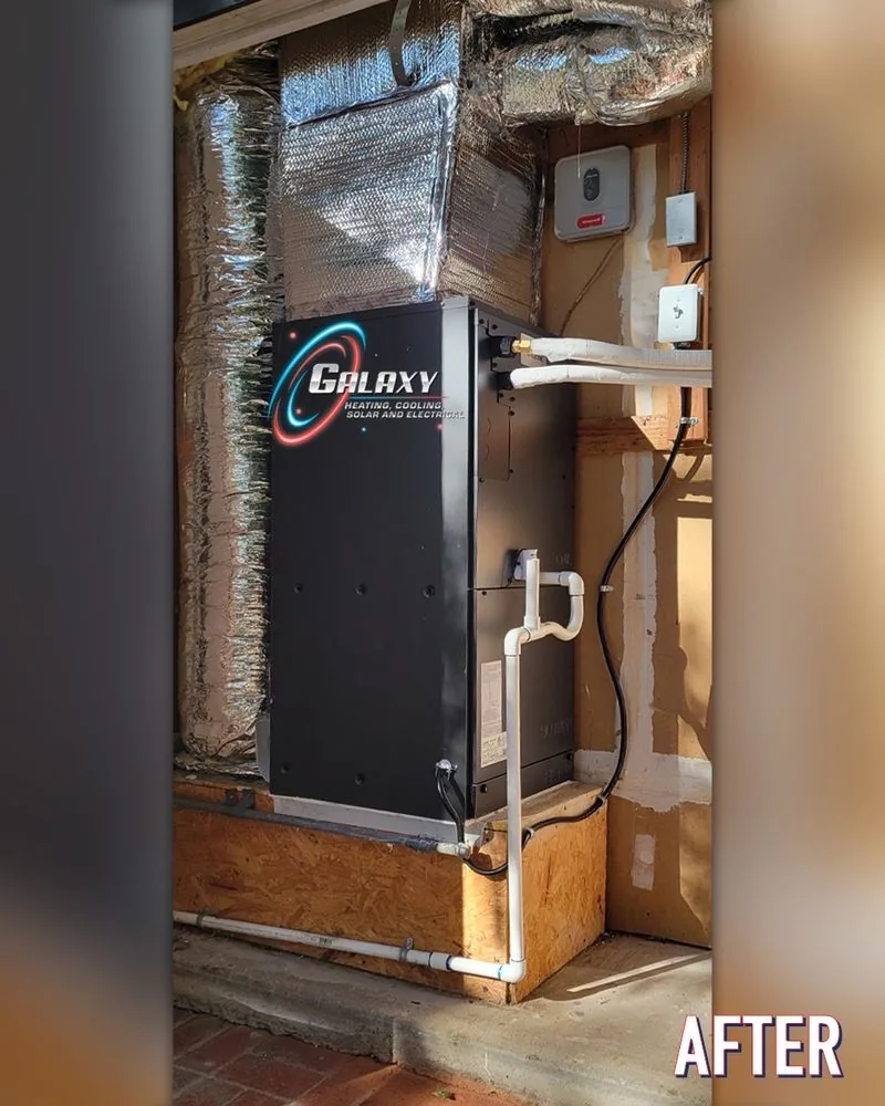 Vertical air handler with foil-faced ductwork above a raised platform in San Francisco