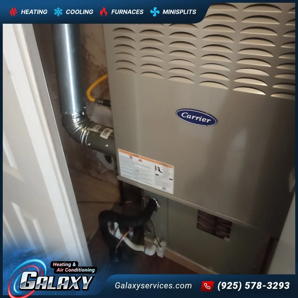 Carrier gas furnace in a closet with metal venting and a flexible gas connection in Oakland
