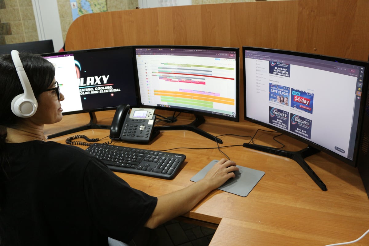 Galaxy customer service representative at desk