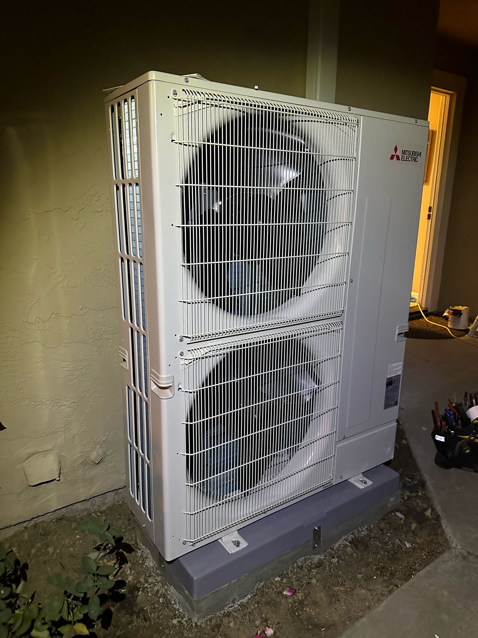 Mitsubishi Hyper-Heat 2-fan multi-zone heat pump outdoor unit installed by Galaxy Heating & Air at a Hillcrest Antioch home
