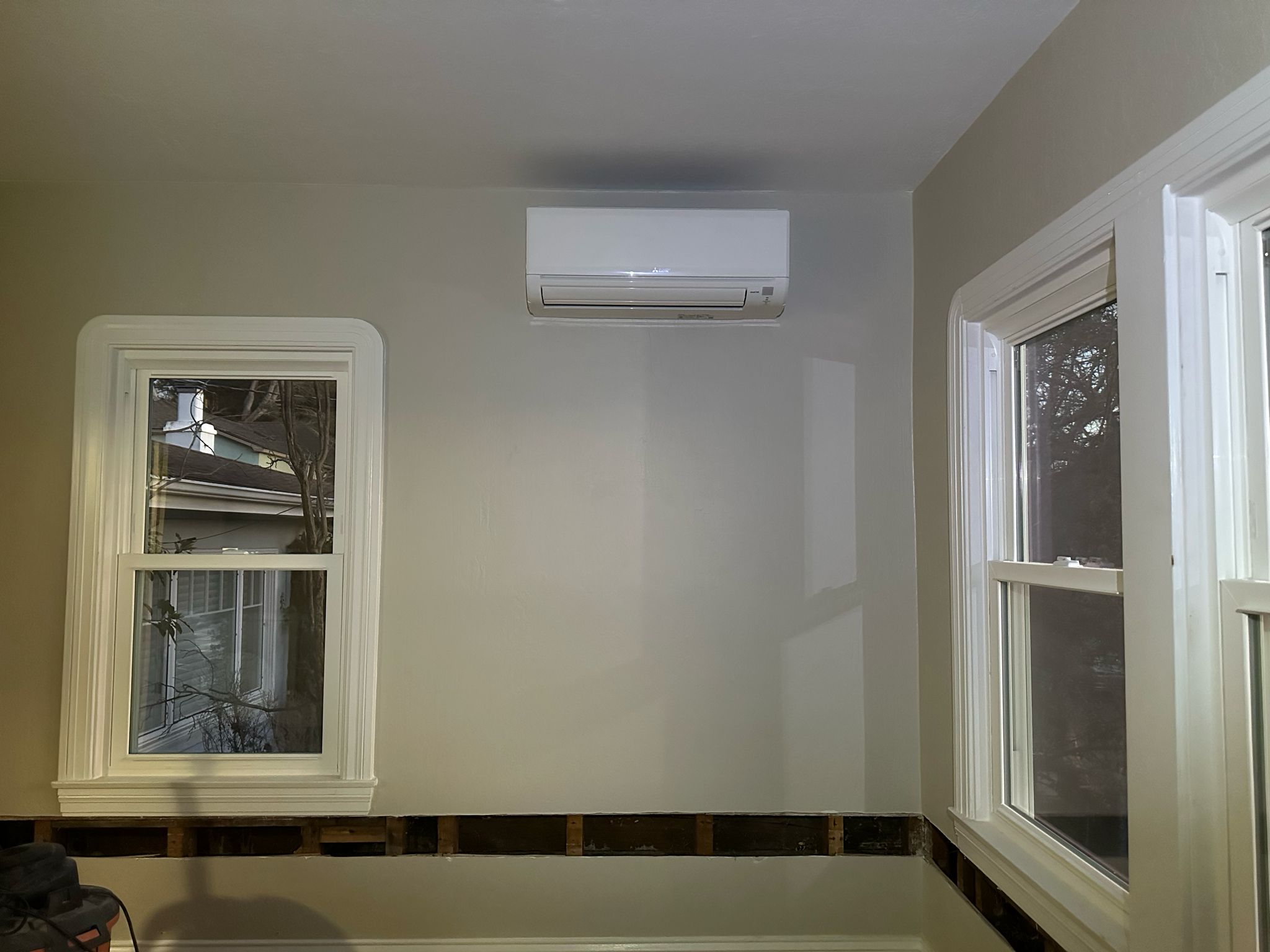 Mitsubishi wall-mounted ductless head installed by Galaxy Heating & Air during a renovation at a Belmont Heights home