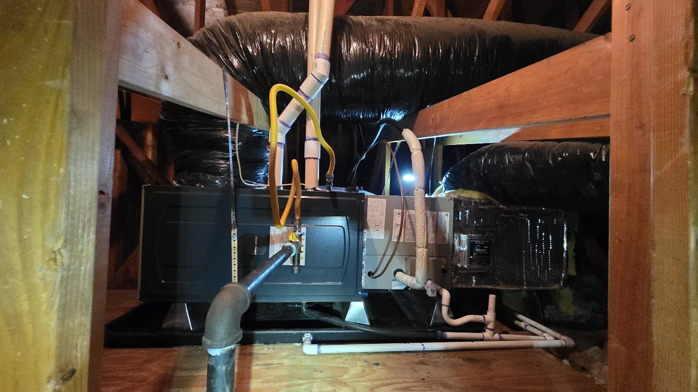 Attic-mounted indoor heating and cooling equipment installed at a Brentwood home