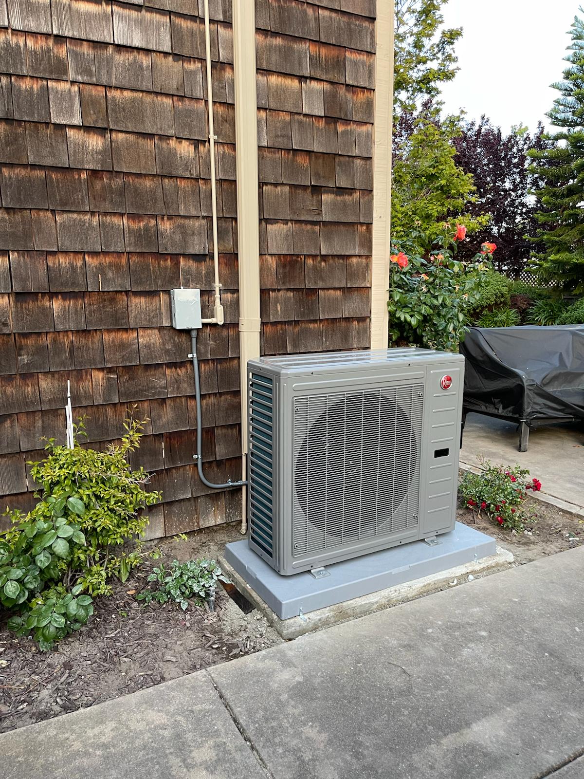 Rheem inverter-driven heat pump outdoor unit installed by Galaxy Heating & Air at a Country Club Los Altos home