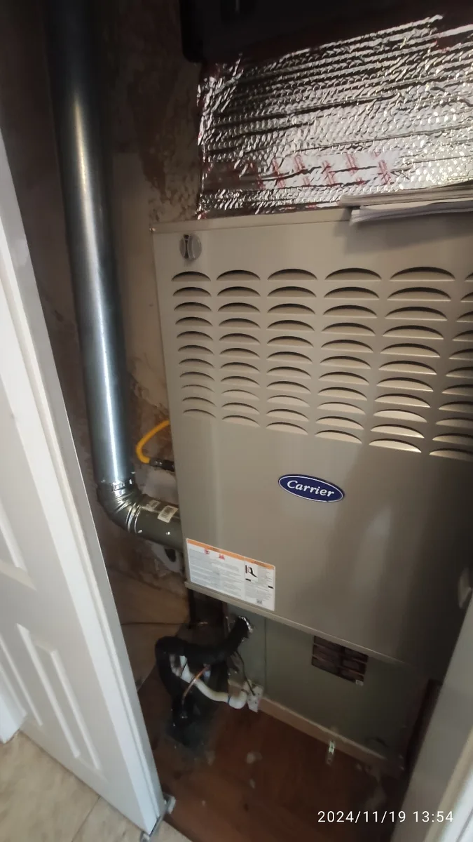 Carrier gas furnace installed in an equipment closet at a Walnut Creek home